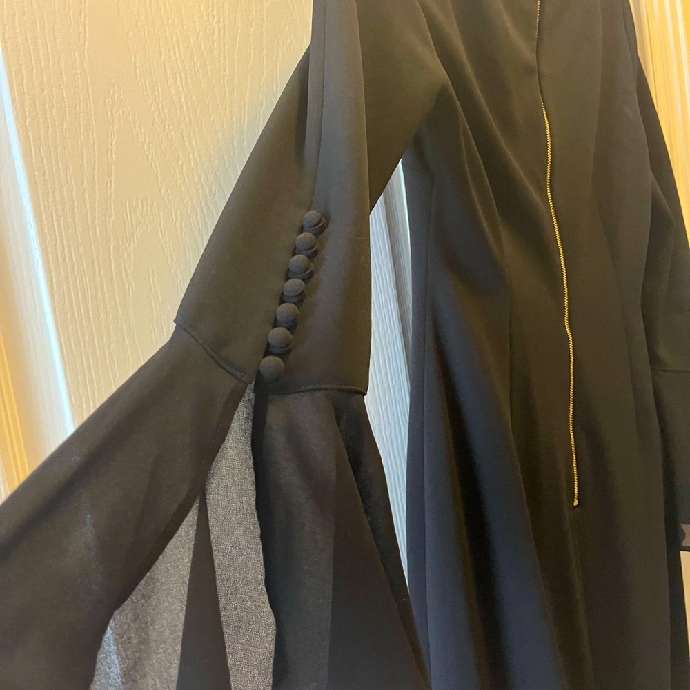 Calvin Klein black sheath dress for any occasion.